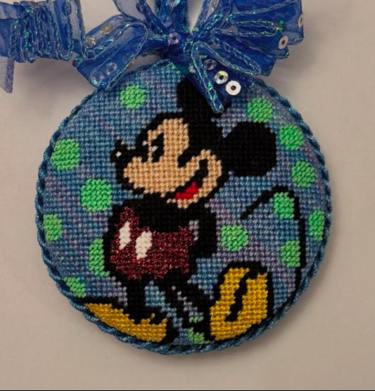 Decorative ornament with an iconic cartoon character on a blue background
